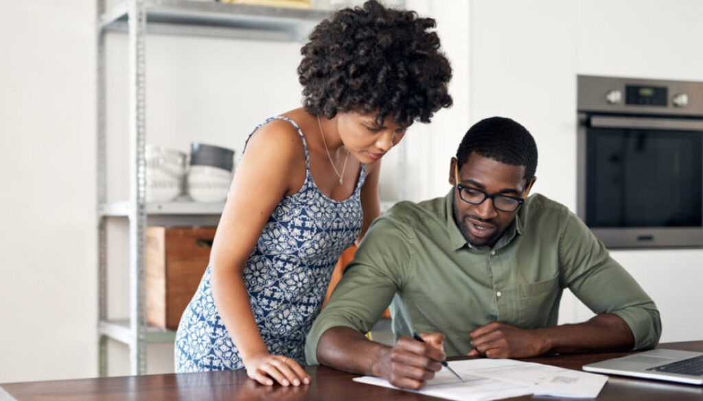 couple-looking-over-financial-documents.jpg